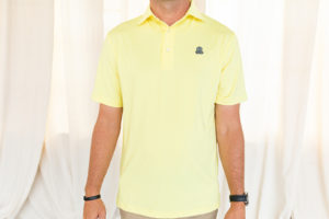 Front view of pale yellow polo