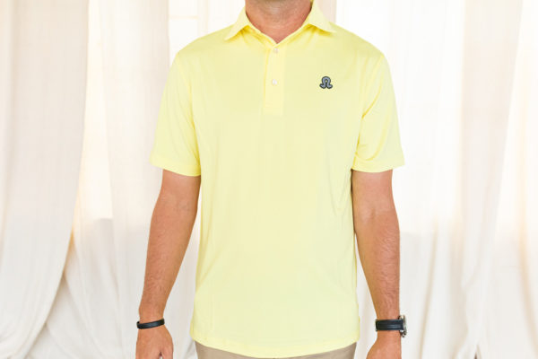 Front view of pale yellow polo