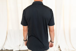 Back view of black polo