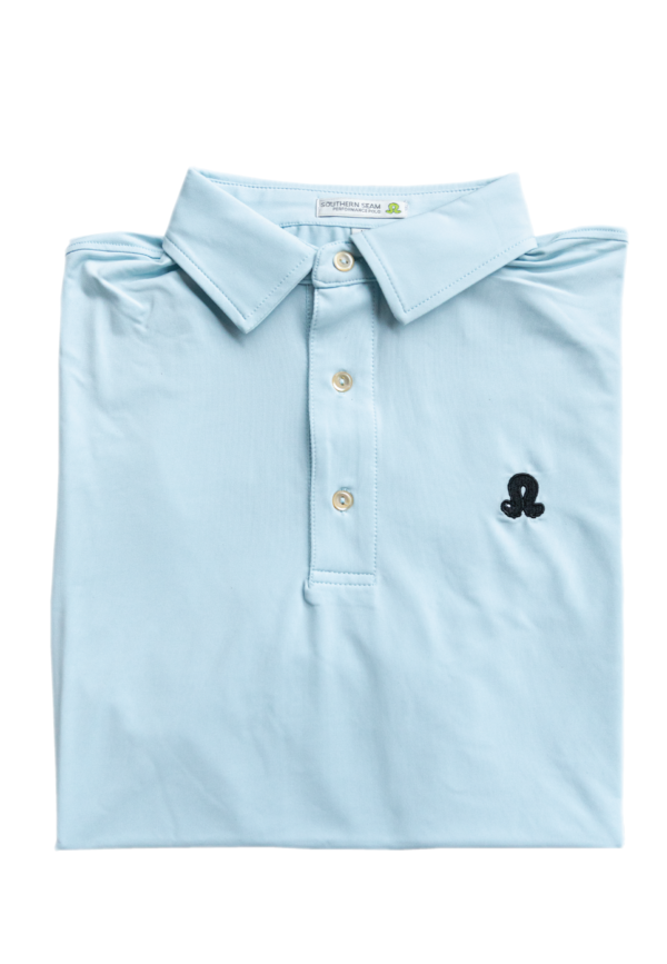 Pale blue shirt folded on a white background